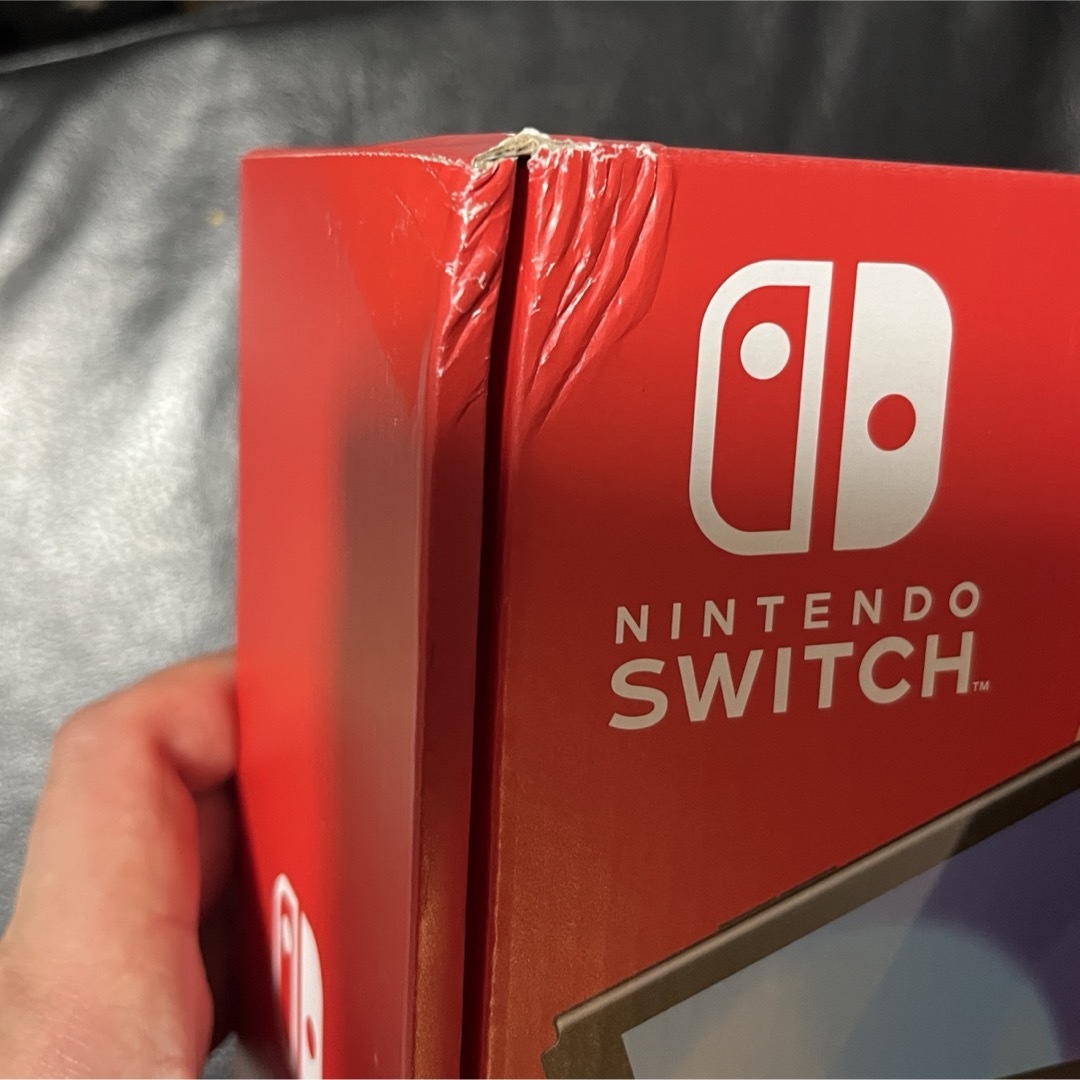 Nintendo Switch(ニンテンドースイッチ)のNintendoSwitch 有機ELモデル 未使用 箱傷あり エンタメ/ホビーのゲームソフト/ゲーム機本体(携帯用ゲーム機本体)の商品写真