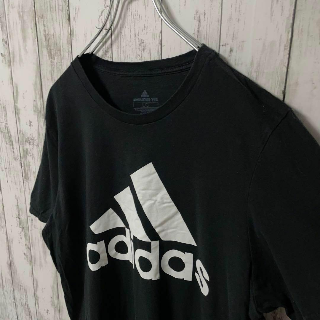 adidas(アディダス)のアディダス アメリカ古着 パフォーマンスロゴプリントTシャツ半袖ブラックメンズ メンズのトップス(Tシャツ/カットソー(半袖/袖なし))の商品写真