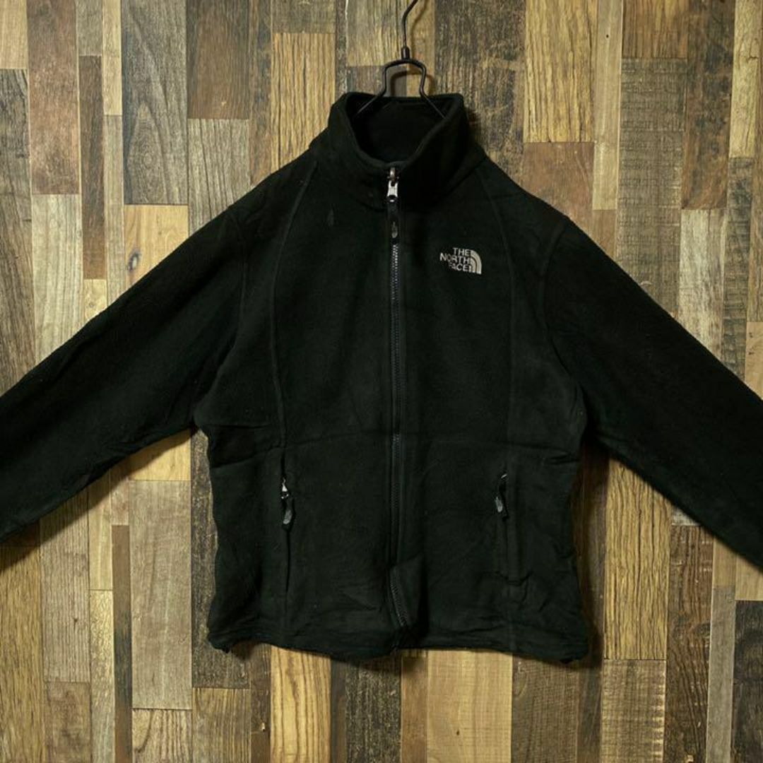 THE NORTH FACE(ザノースフェイス)のノースフェイス レディース フリース ジャケット 黒 ロゴ古着 長袖 アウター メンズのジャケット/アウター(ブルゾン)の商品写真