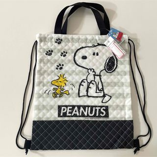 スヌーピー(SNOOPY)の【新品未使用】スヌーピー キルト ナップサック おでかけ 遠足 ネームタグ(リュックサック)