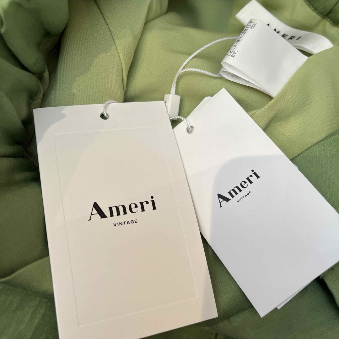 Ameri VINTAGE(アメリヴィンテージ)の新品未使用タグ付き AMERI SHEER BUTTON PANTS レディースのパンツ(カジュアルパンツ)の商品写真