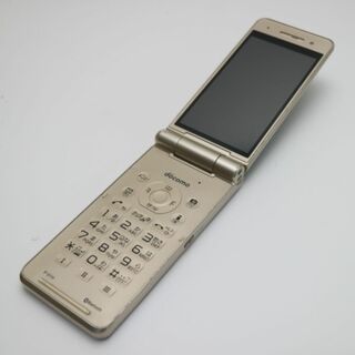 パナソニック(Panasonic)の良品中古 P-01H ゴールド  M888(携帯電話本体)