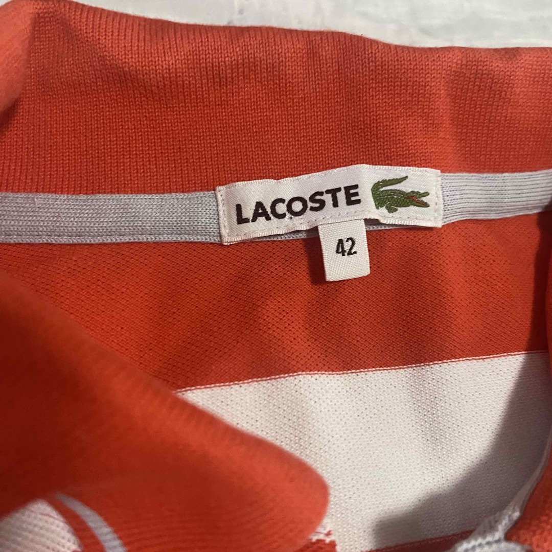 ポロシャツ LACOSTE ラコステ ボーダー柄　オレンジ レディースのトップス(ポロシャツ)の商品写真