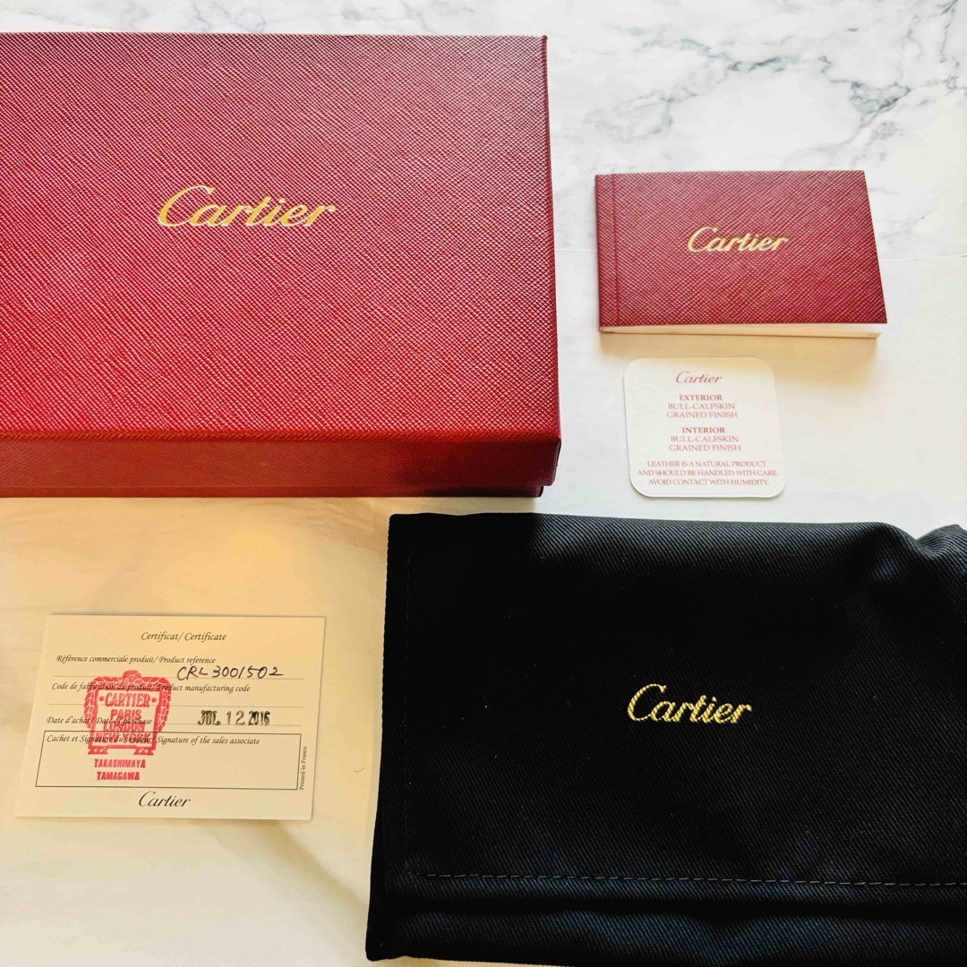 Cartier(カルティエ)の【美品】カルティエ C ドゥ カルティエ コンパクト ２つ折り財布　ボルドー メンズのファッション小物(折り財布)の商品写真