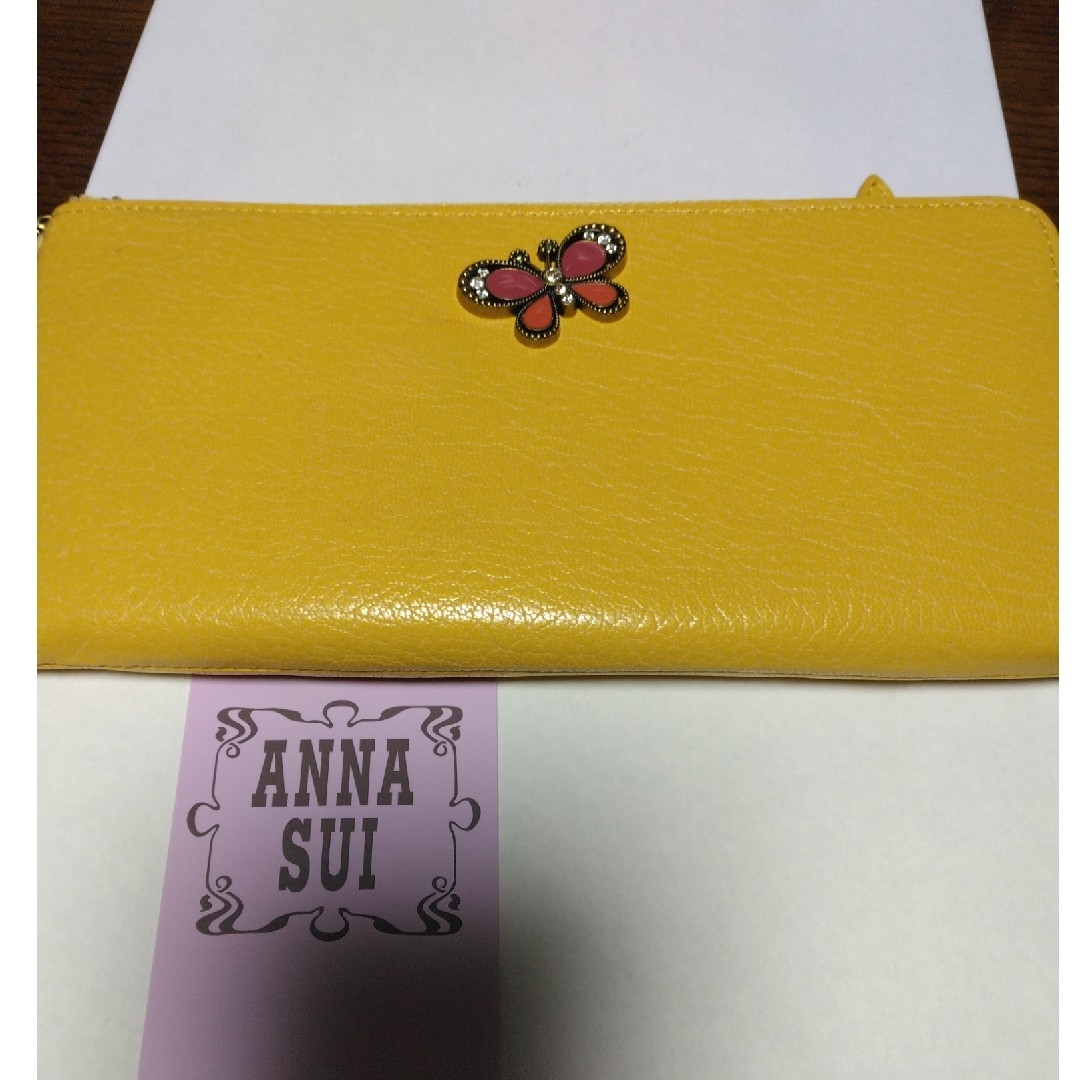 ANNA SUI(アナスイ)のANNA SUI　長財布　黄色　バタフライチャーム　可愛いです！ レディースのファッション小物(財布)の商品写真