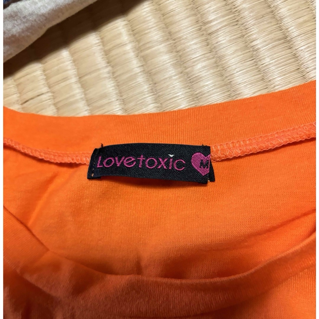 lovetoxic(ラブトキシック)のLOVE TOXIC ラブトキシック　Tシャツ　オレンジ　キッズ　150cm キッズ/ベビー/マタニティのキッズ服女の子用(90cm~)(Tシャツ/カットソー)の商品写真