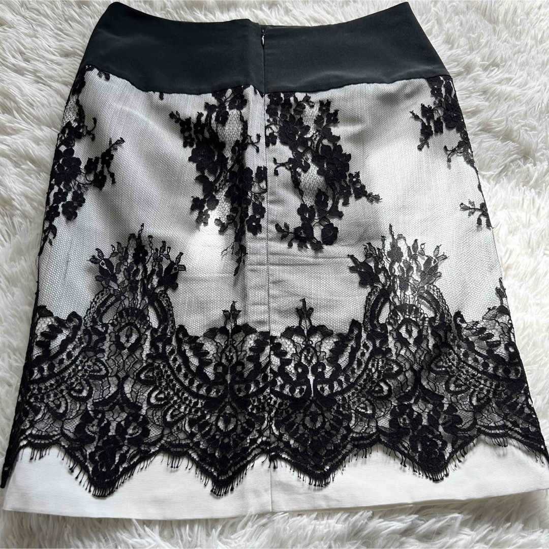 HAN AHN SOON(ハンアンスン)のHAN AHN SOON　ハンアンスン　ティアード　タイトスカート　ブラック レディースのスカート(ひざ丈スカート)の商品写真