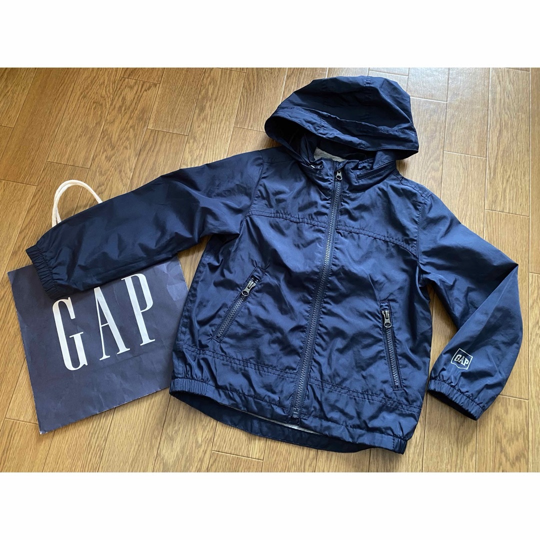 GAP Kids(ギャップキッズ)のGAPKIDSパーカーウインドブレーカー★シンプルXS110cm紺シャカシャカ キッズ/ベビー/マタニティのキッズ服男の子用(90cm~)(ジャケット/上着)の商品写真