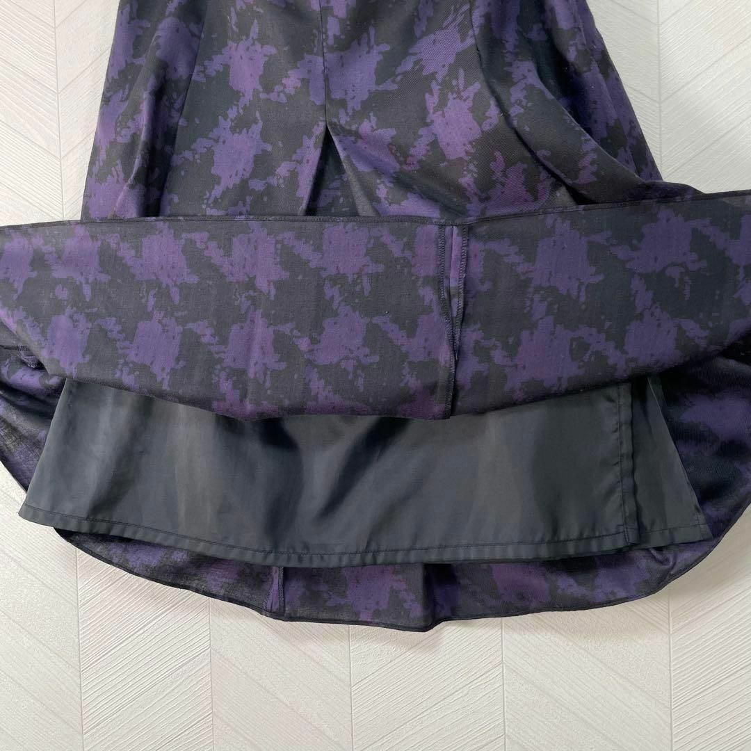 UNTITLED(アンタイトル)のUNTITLED スカート フレア 総柄 千鳥 膝丈 きれいめ 裏地付き 紫 黒 レディースのスカート(ひざ丈スカート)の商品写真