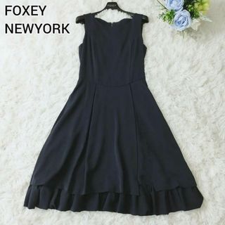 フォクシーニューヨーク(FOXEY NEW YORK)の美品フォクシーニューヨーク ブリストル ワンピース 裾フリル 38 S ネイビー(ひざ丈ワンピース)