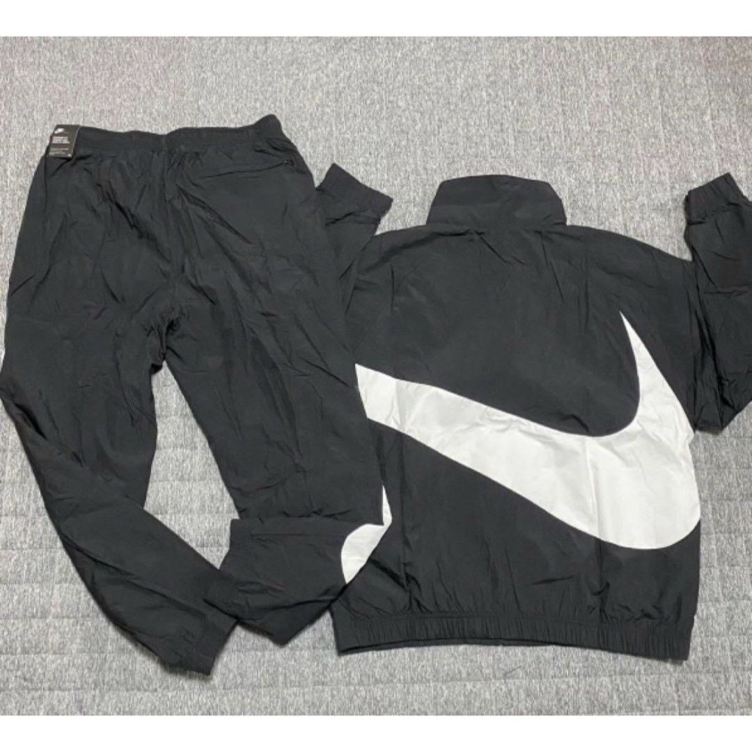 NIKE(ナイキ)のXXL NIKE ビッグスウッシュ セットアップ ウーブン ジャケット 上下 黒 メンズのジャケット/アウター(ナイロンジャケット)の商品写真