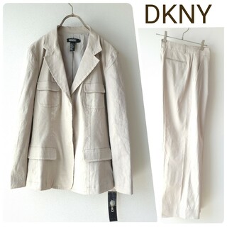 ダナキャランニューヨーク(DKNY)の新品未使用タグ付き　DKNY　リネンパンツスーツ　サイズL相当　ストレッチ　比翼(スーツ)