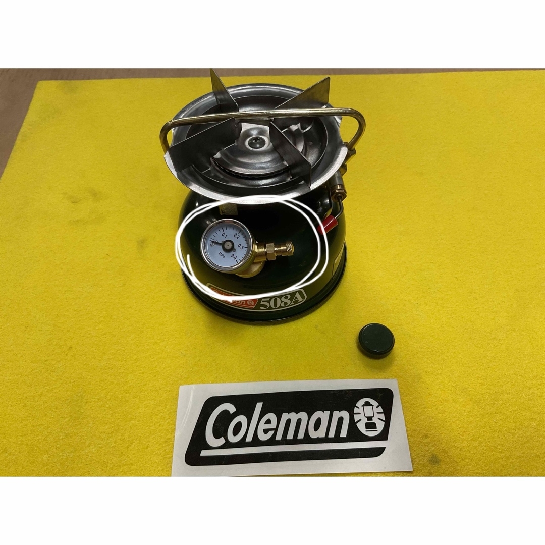 Coleman(コールマン)のColeman 33ミリタンクキャップ装着圧力計エアーバルブ付き　新品 スポーツ/アウトドアのアウトドア(ストーブ/コンロ)の商品写真