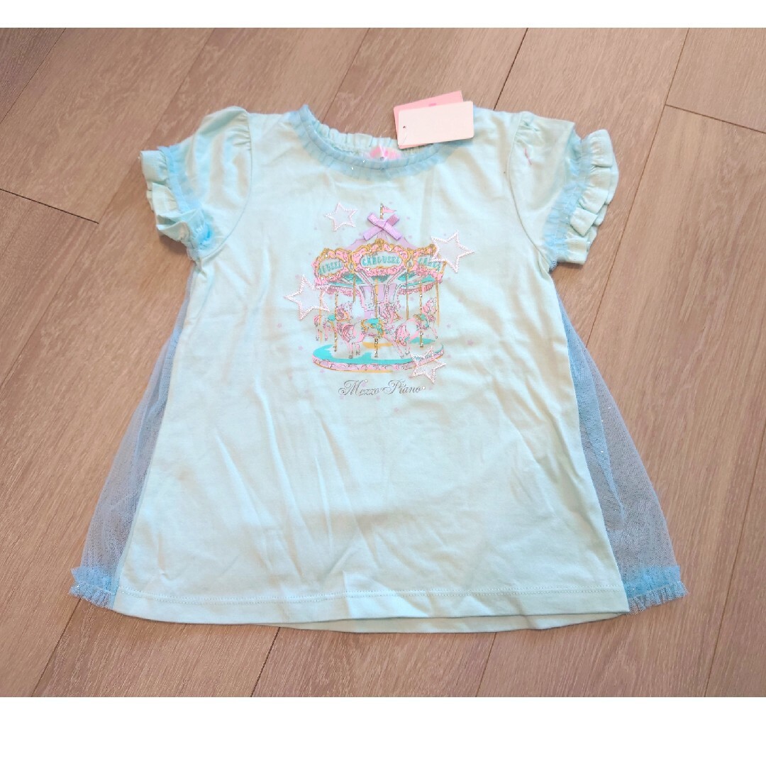 mezzo piano(メゾピアノ)の＊新品＊メゾピアノ メリーゴーランドフリルTシャツ 130 キッズ/ベビー/マタニティのキッズ服女の子用(90cm~)(Tシャツ/カットソー)の商品写真