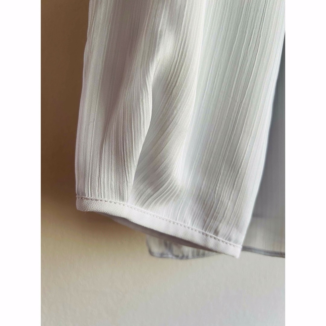 ReFLEcT(リフレクト)のリフレクト　ブラウス　水色　スーツ下 レディースのトップス(シャツ/ブラウス(長袖/七分))の商品写真
