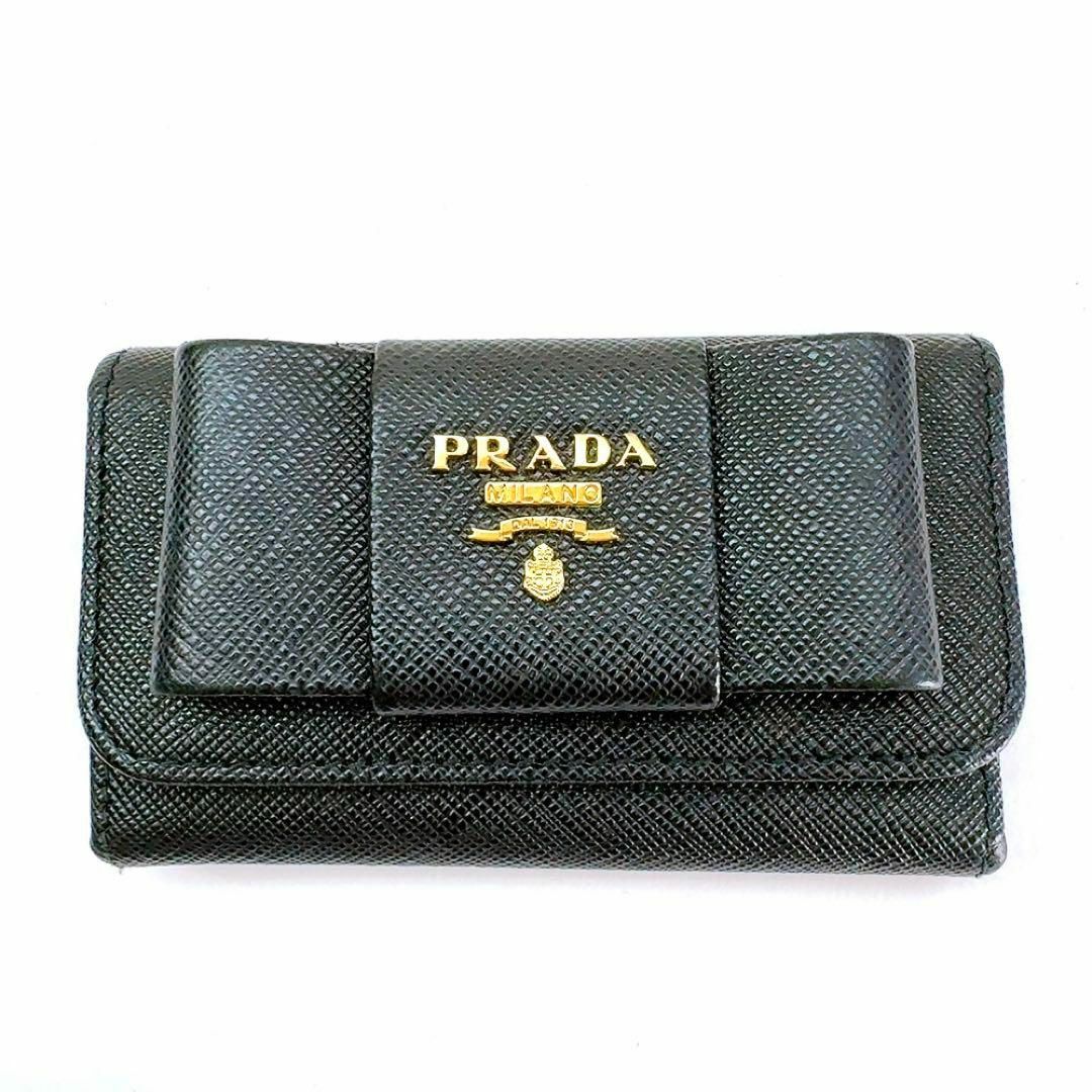PRADA プラダ キーケース リボン ブラック系×ゴールド 6連 サフィアーノ PRADA プラダ キーケース リボン ブラック系×ゴールド 6連 サフィアーノ