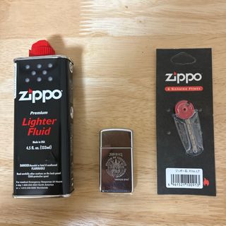 ジッポー(ZIPPO)のZippo自由の女神スリムライター➕専用オイル新品➕専用石新品の3点セット(タバコグッズ)