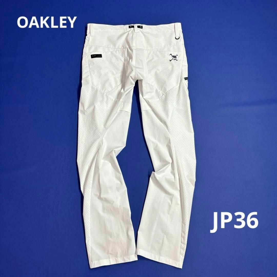 Oakley(オークリー)のオークリー　JP36 メンズゴルフ　ロングパンツ　ホワイト　大きいサイズ スポーツ/アウトドアのゴルフ(ウエア)の商品写真