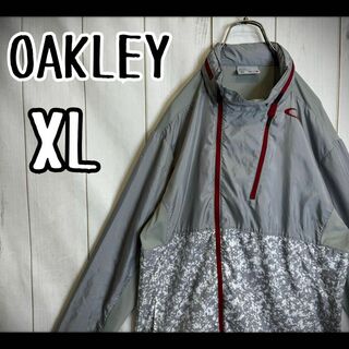 Oakley - 【希少デザイン】　オークリー　ナイロンジャケット　フード内蔵　特殊デザイXL