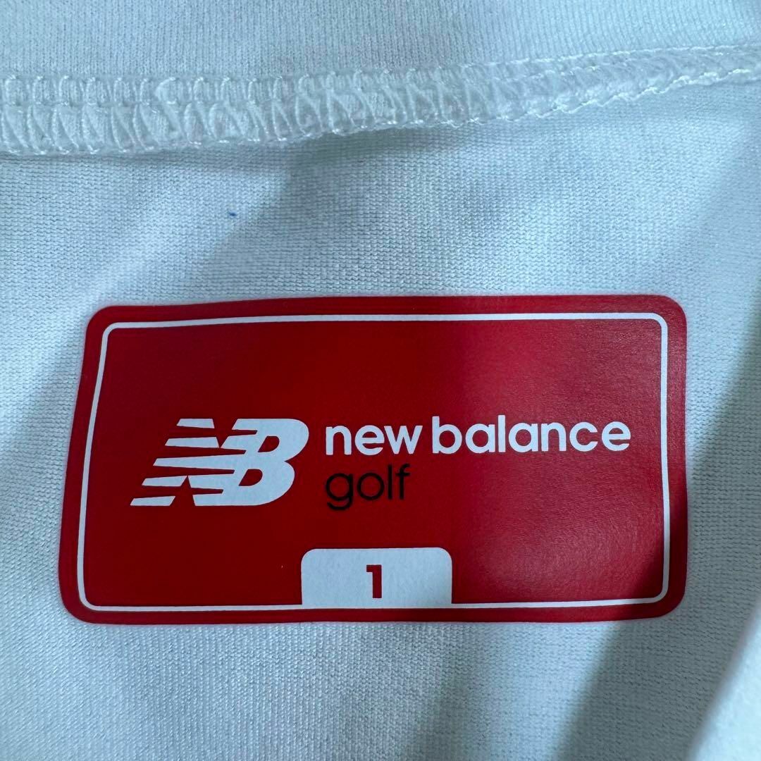 new balance golf(ニューバランスゴルフ)の美品 NEW BALANCE GOLF モックネック 半袖 ワンピース 1 スポーツ/アウトドアのゴルフ(ウエア)の商品写真