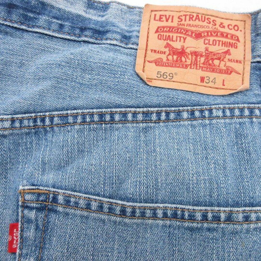 Levi's(リーバイス)のW36★古着 リーバイス Levis 569 ショート パンツ ショーツ メンズ ヒゲ コットン 紺 ネイビー デニム 24apr16 中古 ボトムス 短パン ショーパン ハーフ メンズのパンツ(ワークパンツ/カーゴパンツ)の商品写真