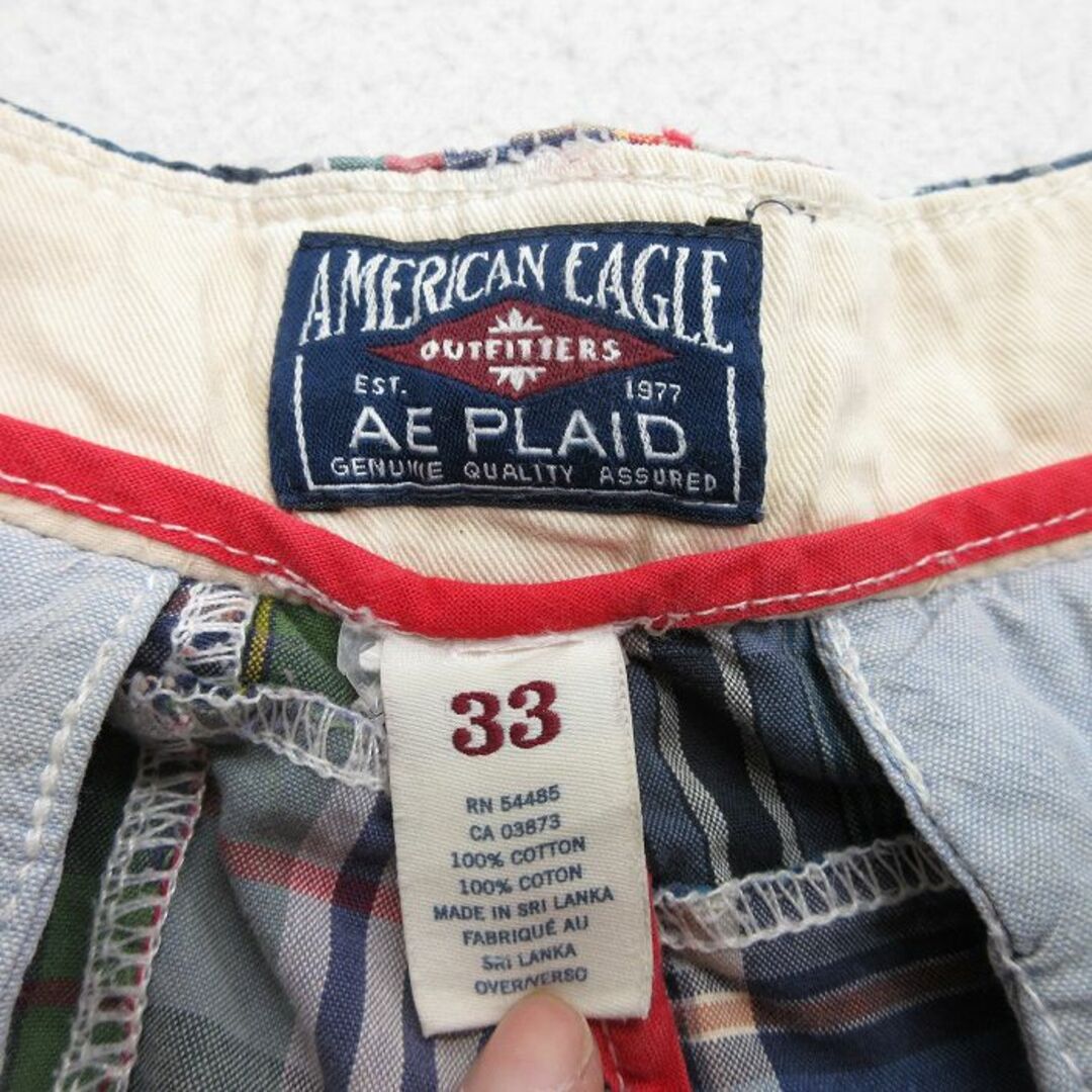 American Eagle(アメリカンイーグル)のW35★古着 アメリカンイーグル American Eagle ショート パンツ ショーツ メンズ パッチワーク コットン 紺他 ネイビー チェック 【spe】 24apr16 中古 ボトムス 短パン ショーパン ハーフ メンズのパンツ(ワークパンツ/カーゴパンツ)の商品写真