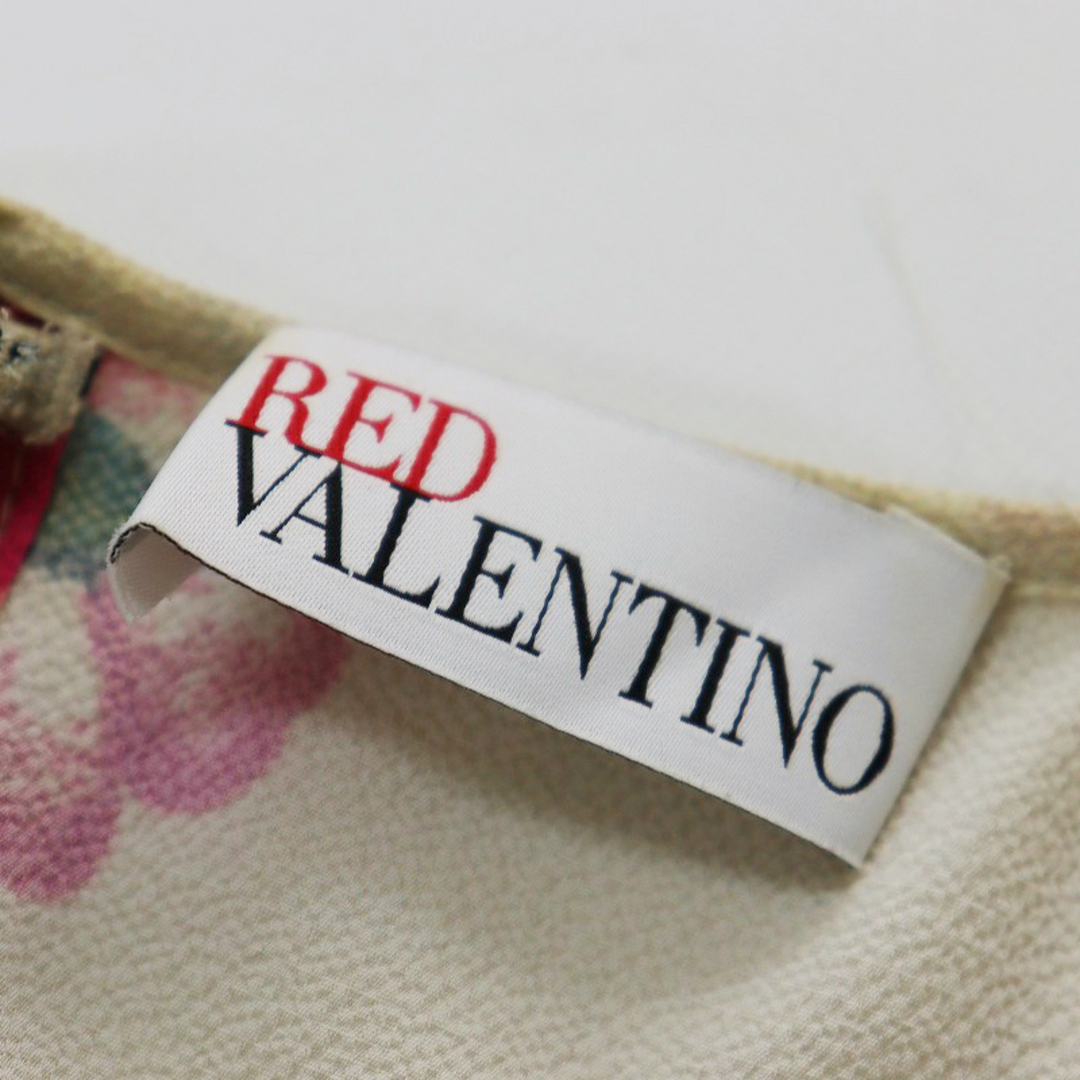 RED VALENTINO(レッドヴァレンティノ)の国内 JPタグ レッドヴァレンティノ RED VALENTINO フラワープリントスタッズブラウス 40/アイボリー プルオーバー【2400013825870】 レディースのトップス(シャツ/ブラウス(長袖/七分))の商品写真