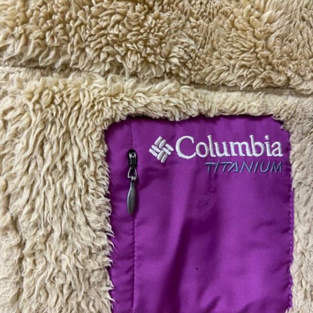 Columbia(コロンビア)のcolumbia(コロンビア) ブルゾン サイズM レディース - ベージュ×パープル 長袖/フェイクファー/ジップアップ/冬 レディースのジャケット/アウター(ブルゾン)の商品写真