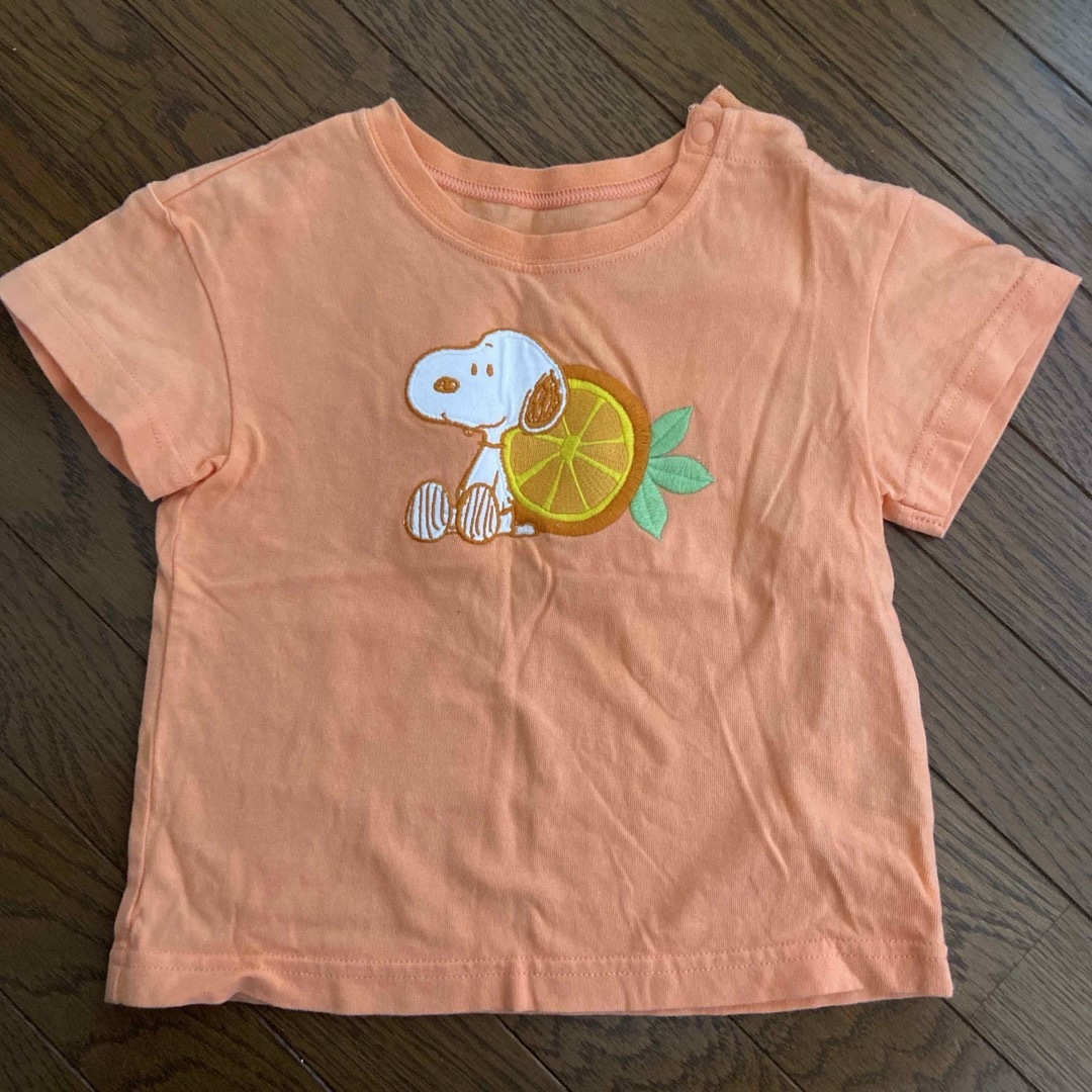 GU(ジーユー)のGU オレンジ　スヌーピー　Tシャツ　90 キッズ/ベビー/マタニティのキッズ服女の子用(90cm~)(Tシャツ/カットソー)の商品写真