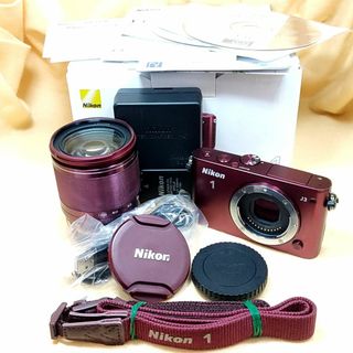 ニコン(Nikon)のミラーレス Nikon 1 J3 小型10倍ズームキット レッド(ミラーレス一眼)