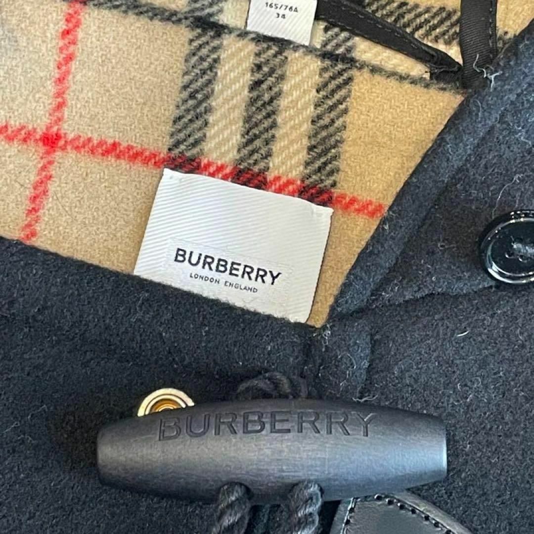 BURBERRY(バーバリー)のバーバリー 現行ライン 黒 ダッフルコート ノバチェック 34サイズ レディースのジャケット/アウター(ダッフルコート)の商品写真