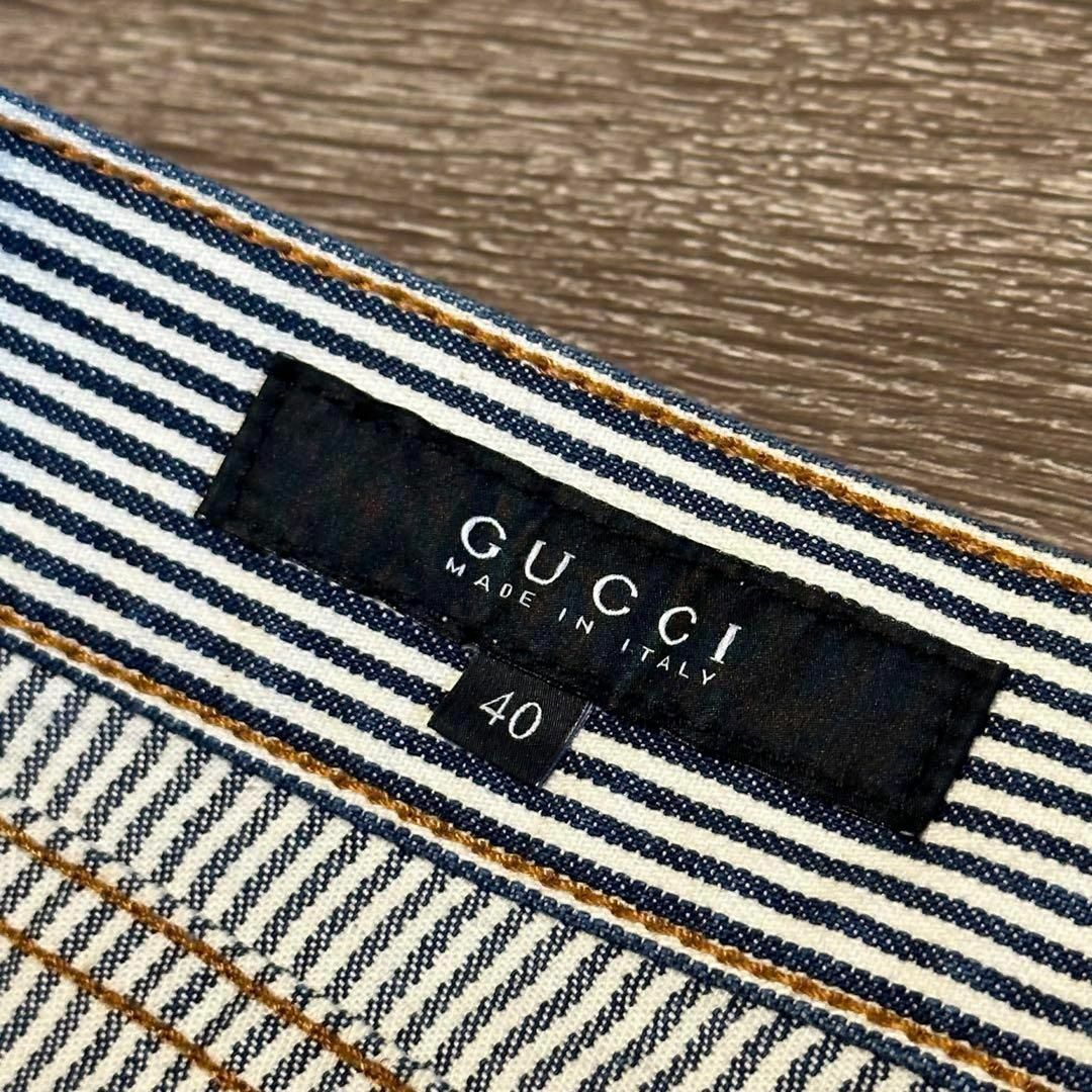 Gucci(グッチ)のグッチ　ネイビー　ストライプ　ヒッコリーパンツ　フレアシルエット　40サイズ レディースのパンツ(カジュアルパンツ)の商品写真