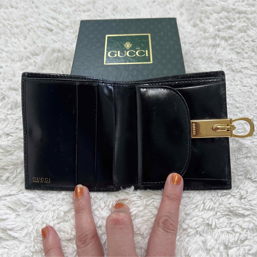 Gucci(グッチ)のヴィンテージGUCCI  グッチ  オールドグッチ 二つ折り財布　黒×ゴールド レディースのファッション小物(財布)の商品写真