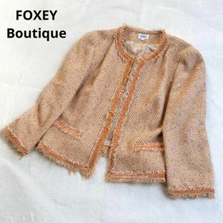 フォクシーブティック(FOXEY BOUTIQUE)のフォクシーブティック　オレンジ　ツイード　ノーカラージャケット　38　アウター(ノーカラージャケット)