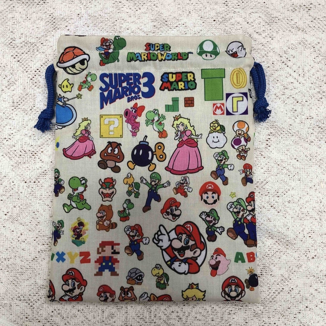 ハンドメイド🌟巾着袋🌟マリオ ハンドメイドのキッズ/ベビー(外出用品)の商品写真