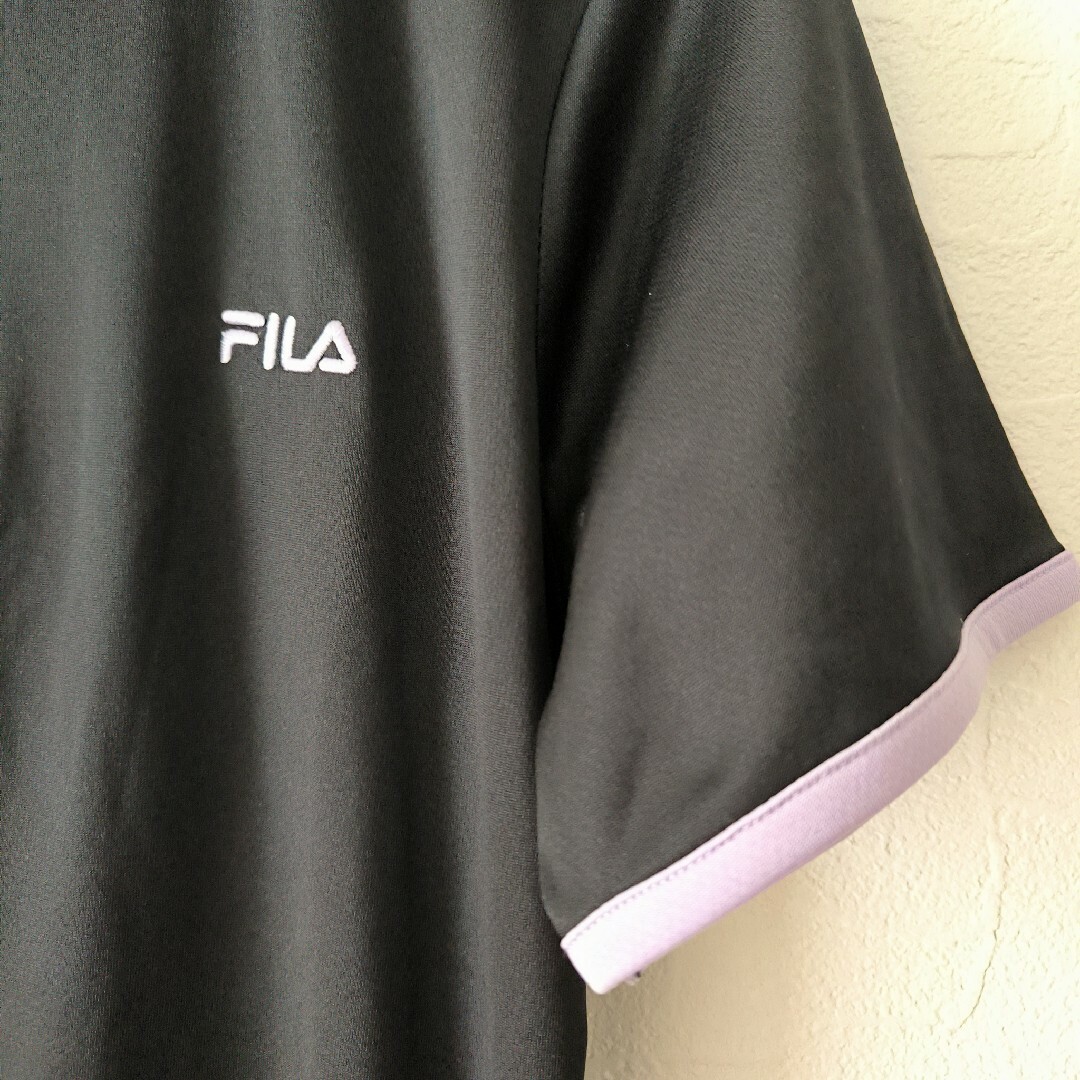 FILA(フィラ)の【FILA】ハーフジップ 半袖ウェア ブラック   M スポーツウェア レディースのトップス(ポロシャツ)の商品写真