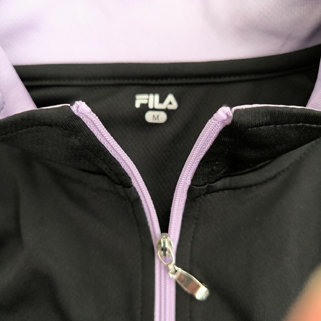 FILA(フィラ)の【FILA】ハーフジップ 半袖ウェア ブラック   M スポーツウェア レディースのトップス(ポロシャツ)の商品写真