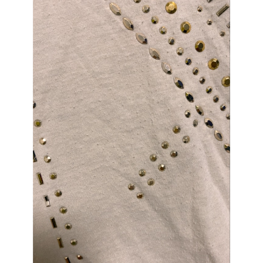 ベージュにゴールドスタッツがたくさんキラキラスリーブ袖裾フリルオシャレチュニック レディースのトップス(チュニック)の商品写真