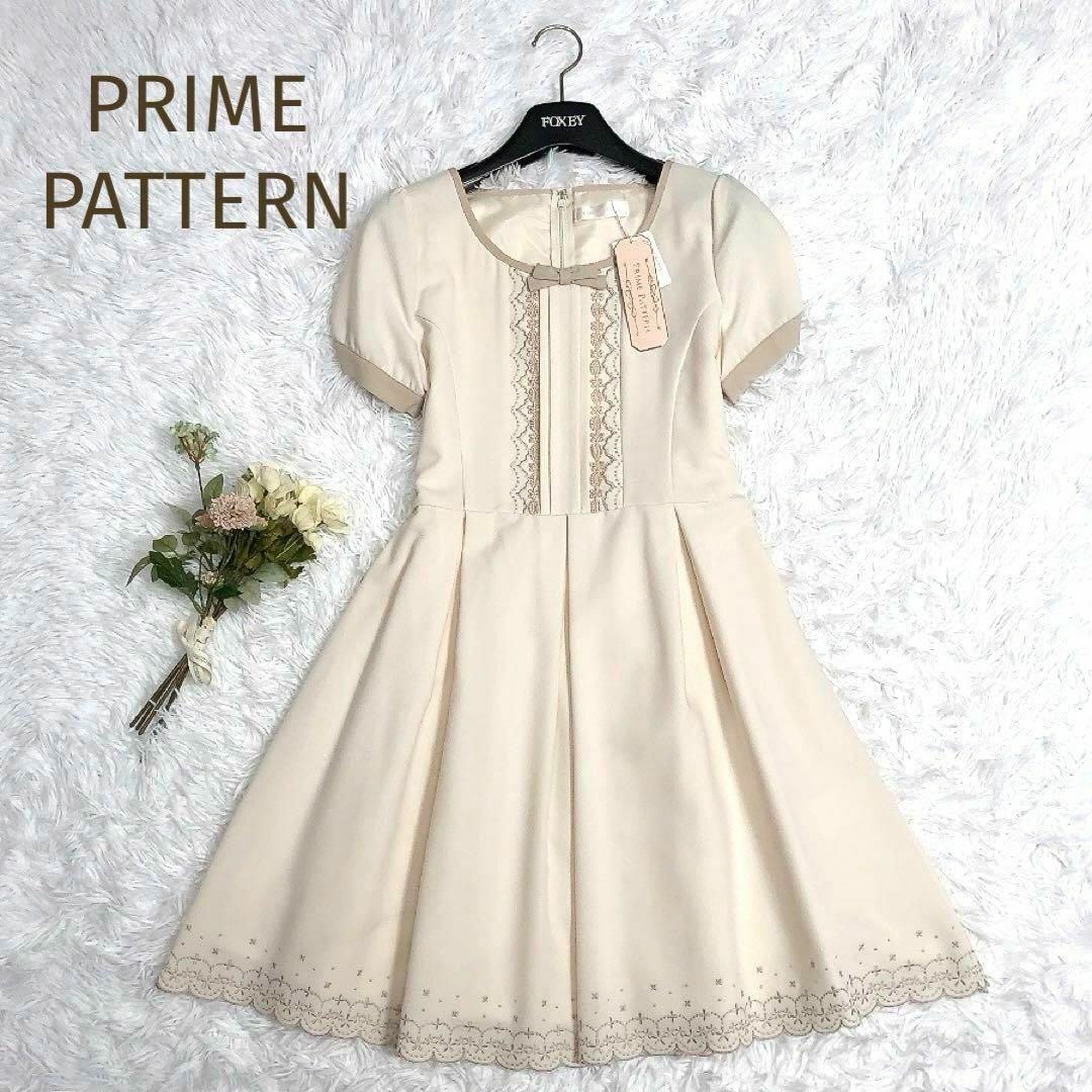 新品タグ付☆PRIME PATTERN☆レースリボン 半袖ワンピース 生成 M レディースのワンピース(ひざ丈ワンピース)の商品写真