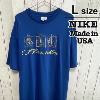 ナイキ(NIKE)のNIKE　USA製　Vintage　Tシャツ　L　ブルー　青　プリント　コットン(Tシャツ/カットソー(半袖/袖なし))