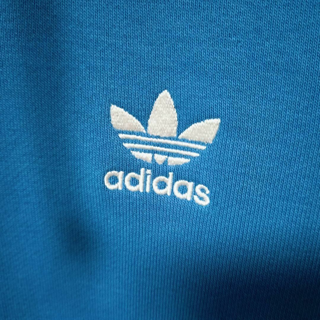 Originals（adidas）(オリジナルス)のadidas 青 エッセンシャルズ プルオーバーパーカー 男性XO 裏起毛 メンズのトップス(パーカー)の商品写真