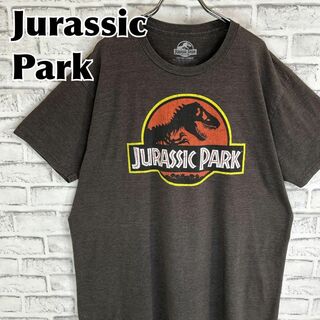 ティービーアンドムービー(TV&MOVIE)のJurassic Park ジュラシックパーク 恐竜 ロゴTシャツ 半袖 輸入品(Tシャツ/カットソー(半袖/袖なし))