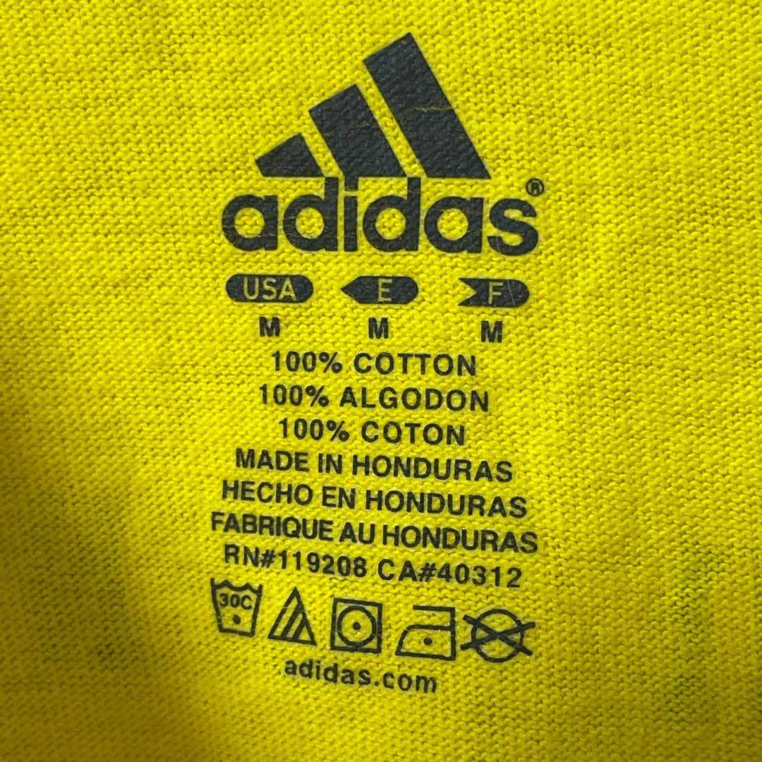 adidas(アディダス)のadidas USA古着 ミシガンウルヴァリンズ アメフトTシャツ M 黄メンズ メンズのトップス(Tシャツ/カットソー(半袖/袖なし))の商品写真