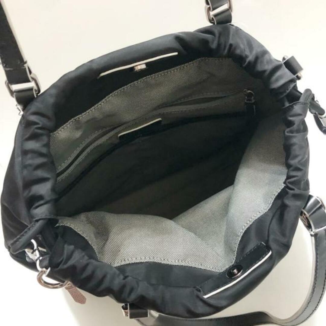 Cole Haan(コールハーン)のCOLE HAAN(コールハーン) ショルダーバッグ - 黒×白×ブラウン GRANDSERIES/巾着型 ポリウレタン×ナイロン×レザー レディースのバッグ(ショルダーバッグ)の商品写真