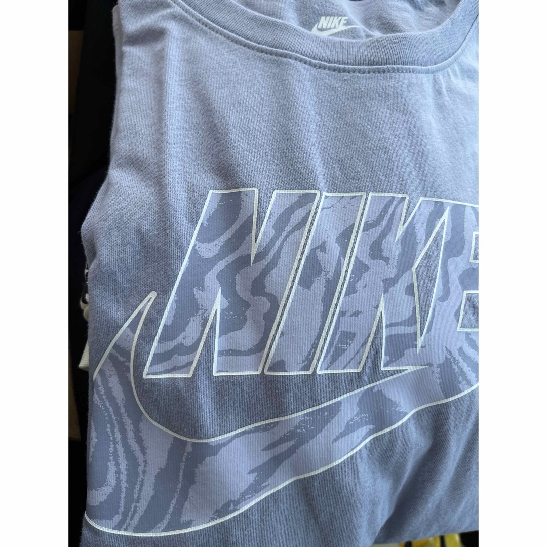 NIKE(ナイキ)のNIKE Tシャツ　Lサイズ　レディース　ナイキ レディースのトップス(Tシャツ(半袖/袖なし))の商品写真