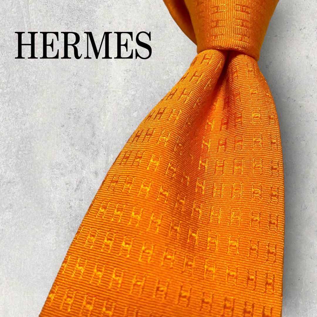 Hermes(エルメス)の極美品 HERMES エルメス ファソネ H柄 総柄 ネクタイ オレンジ メンズのファッション小物(ネクタイ)の商品写真