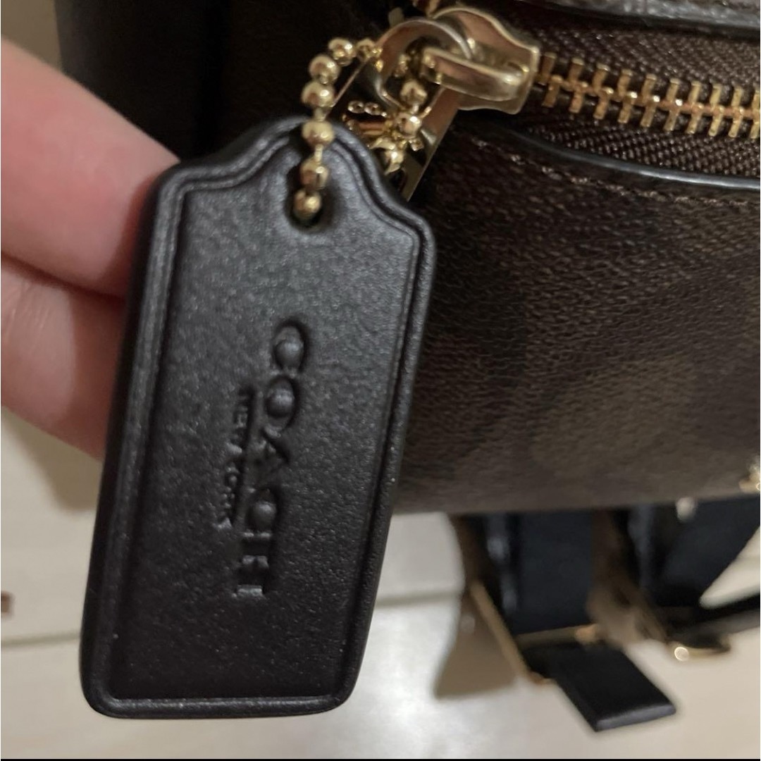 幸ちゃん様専用　coach リュック　シグネチャー美品 レディースのバッグ(リュック/バックパック)の商品写真