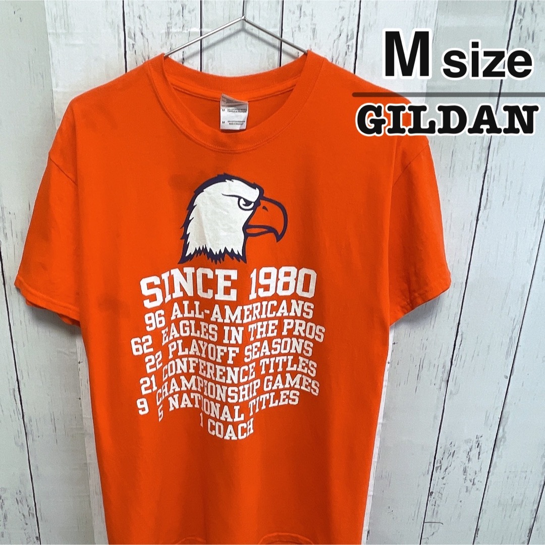 GILDAN(ギルタン)のUSA古着　GILDAN　Tシャツ　M　オレンジ　フットボール　イーグル　ロゴ メンズのトップス(Tシャツ/カットソー(半袖/袖なし))の商品写真