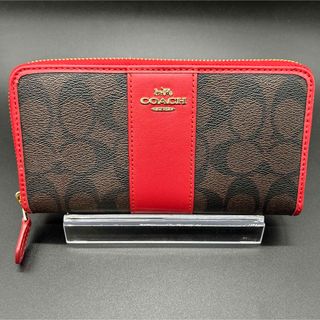 コーチ(COACH)のCOACH コーチ　シグネッチャー　ラウンドジップ　長財布　レッド　未使用保管品(財布)