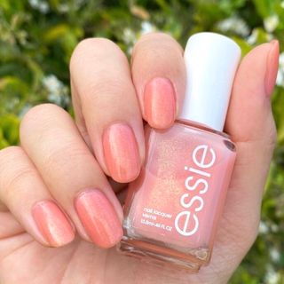 エッシー(Essie)のessie 594 ゴールドラメ❤︎可愛いピーチ 複数購入割&おまけポリ(マニキュア)